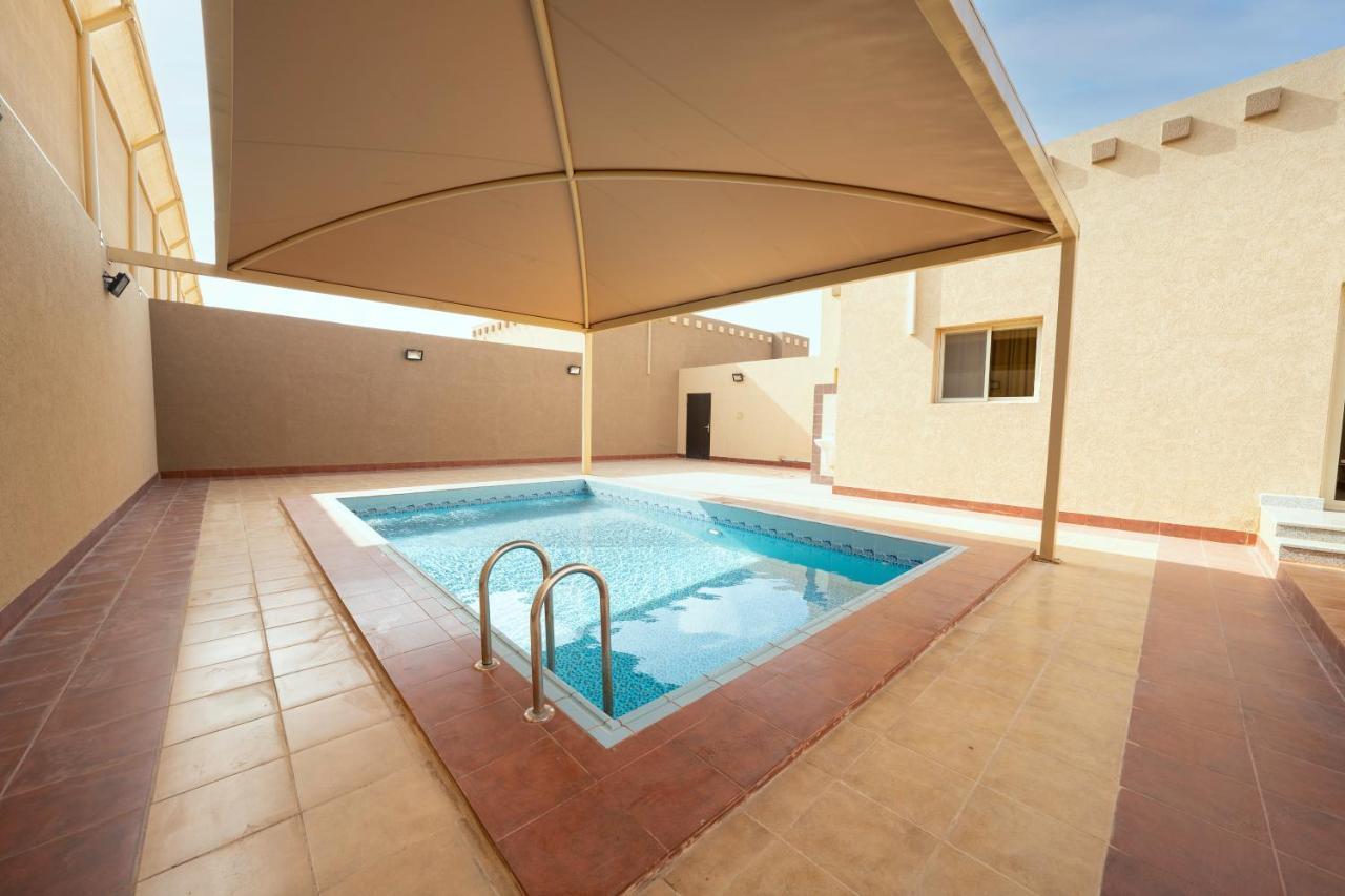 Mirada Gold Jizan - Resort & Private Pools Bagian luar foto A swimming pool in Al-Shaqra, Saudi Arabia